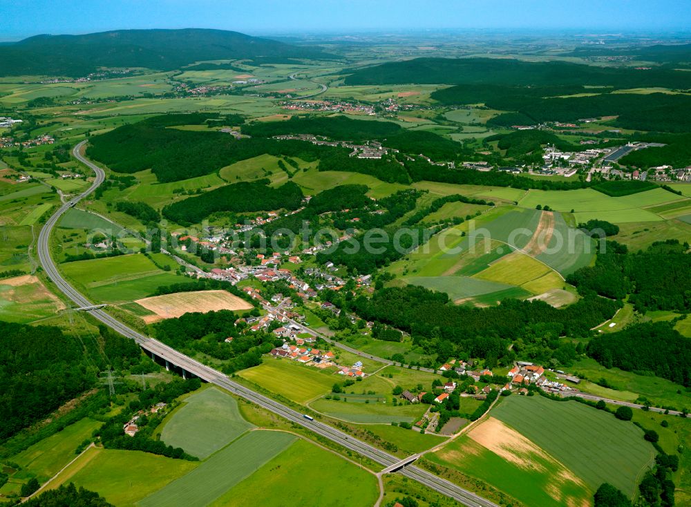 Aerial image Rohrbach - Agricultural land and field boundaries surround the settlement area of the village in Rohrbach in the state Rhineland-Palatinate, Germany