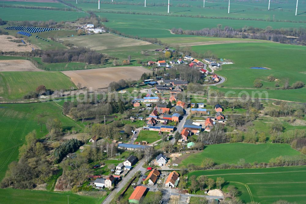 Rom from the bird's eye view: Agricultural land and field boundaries surround the settlement area of the village in Rome in the state Mecklenburg - Western Pomerania, Germany