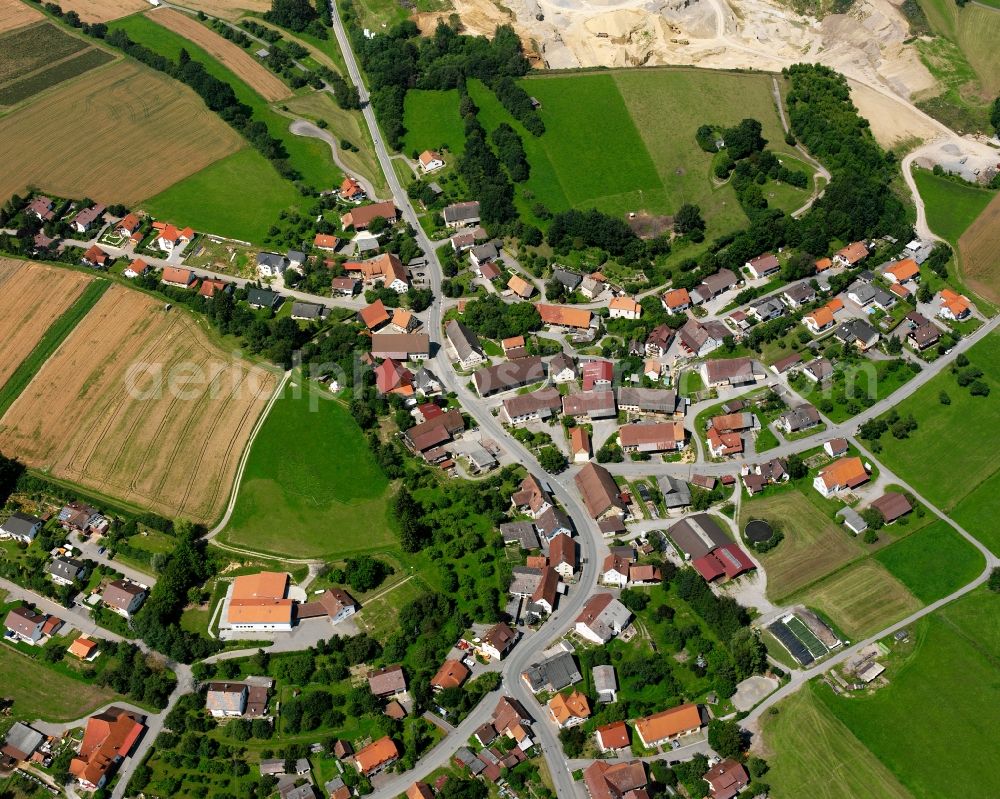 Rosna from above - Agricultural land and field boundaries surround the settlement area of the village in Rosna in the state Baden-Wuerttemberg, Germany