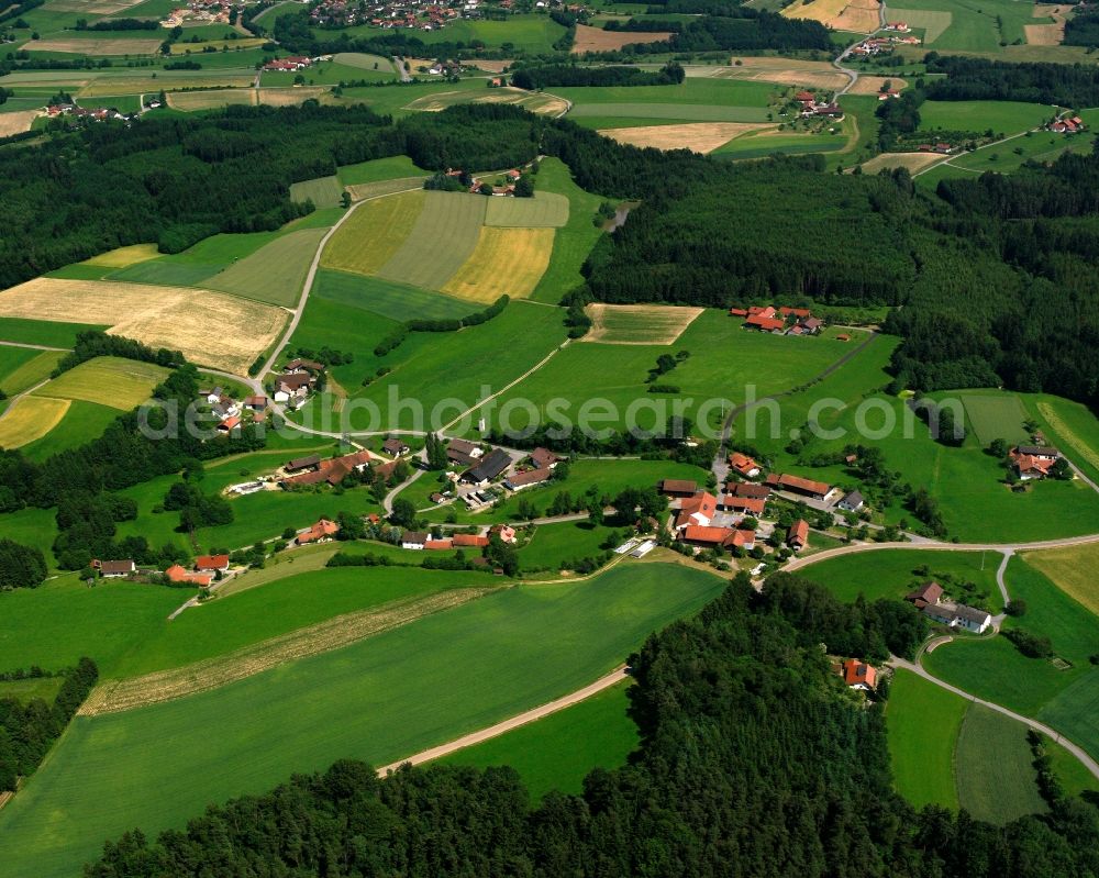 Aerial image Roßhaupten - Agricultural land and field boundaries surround the settlement area of the village in Roßhaupten in the state Bavaria, Germany