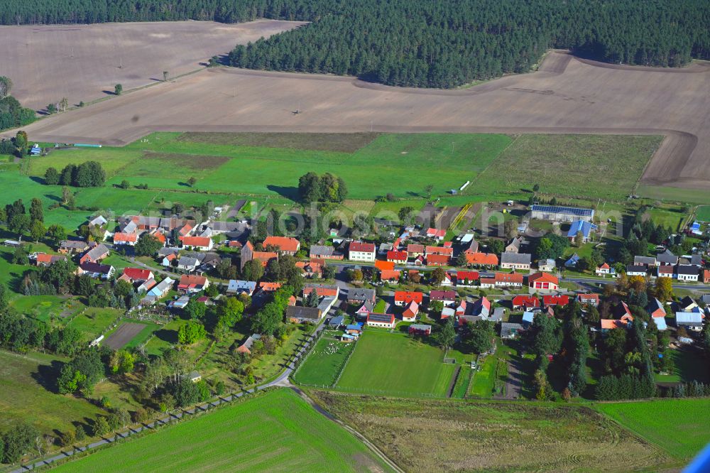 Aerial image Rossow - Agricultural land and field boundaries surround the settlement area of the village in Rossow in the state Brandenburg, Germany