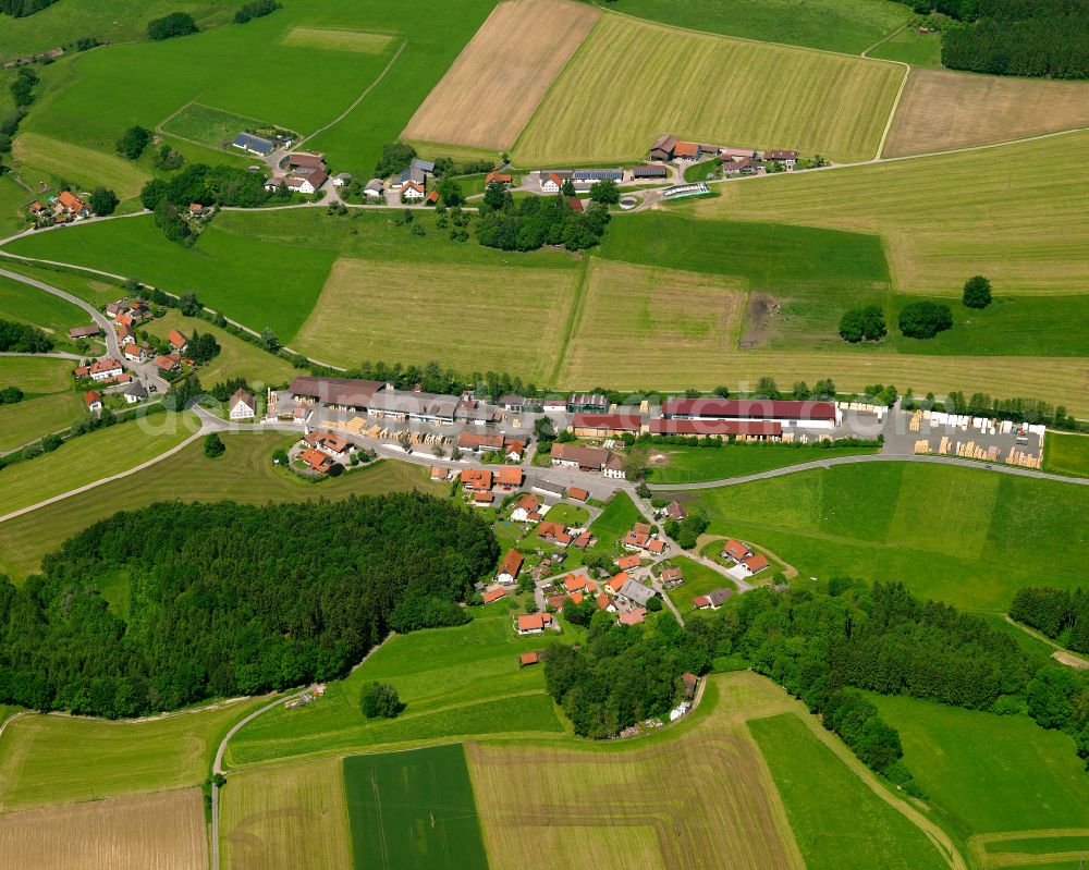 Aerial photograph Rot an der Rot - Agricultural land and field boundaries surround the settlement area of the village in Rot an der Rot in the state Baden-Wuerttemberg, Germany