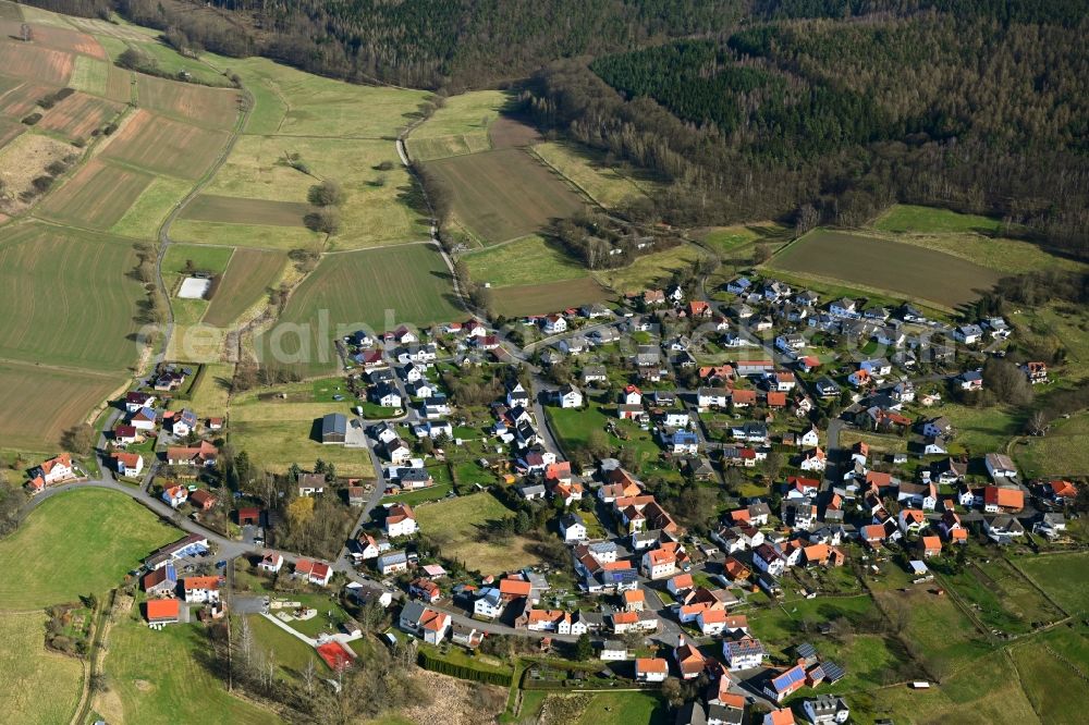 Aerial image Rotensee - Agricultural land and field boundaries surround the settlement area of the village in Rotensee in the state Hesse, Germany