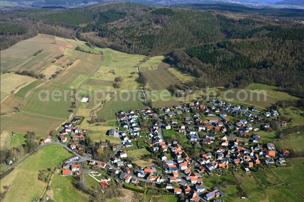 Aerial photograph Rotensee - Agricultural land and field boundaries surround the settlement area of the village in Rotensee in the state Hesse, Germany