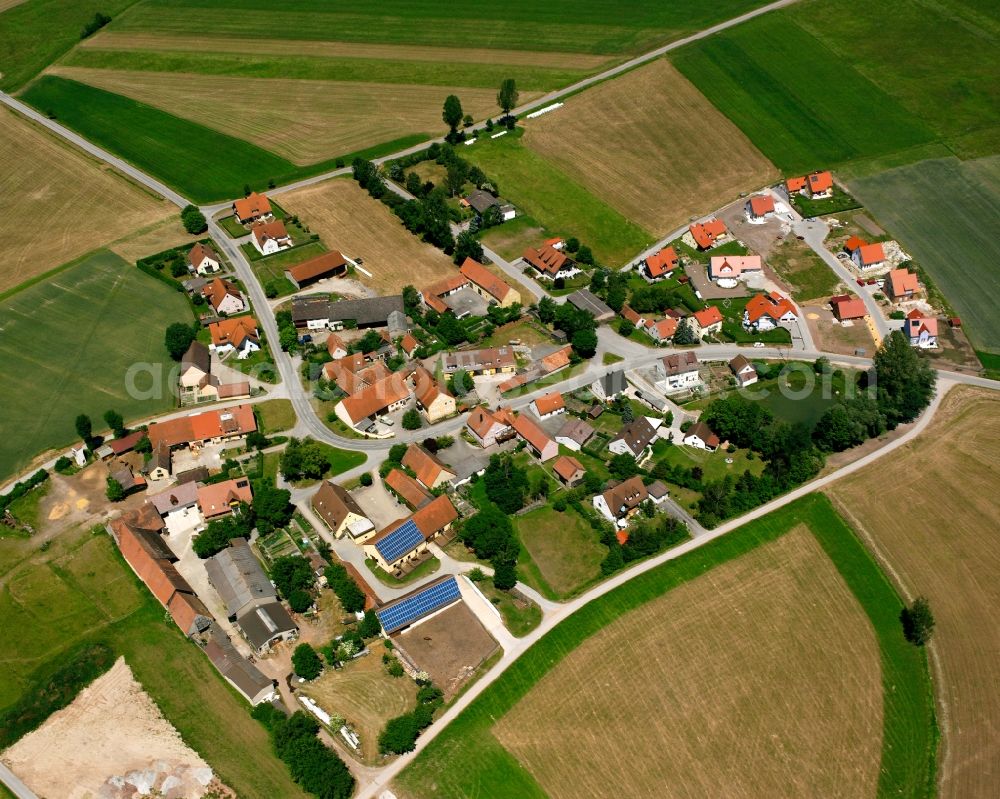 Roth from above - Agricultural land and field boundaries surround the settlement area of the village in Roth in the state Bavaria, Germany