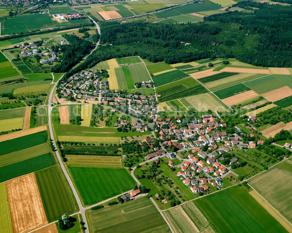 Rottenburg am Neckar from above - Agricultural land and field boundaries surround the settlement area of the village in Rottenburg am Neckar in the state Baden-Wuerttemberg, Germany