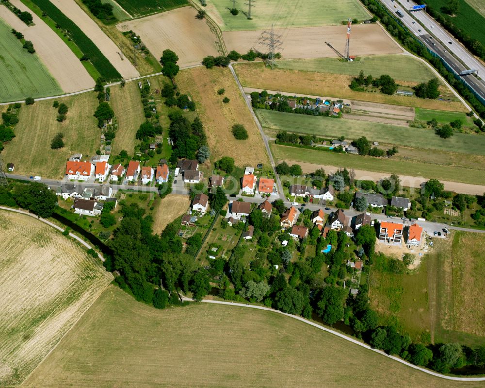 Aerial photograph Rüppurr - Agricultural land and field boundaries surround the settlement area of the village in Rüppurr in the state Baden-Wuerttemberg, Germany