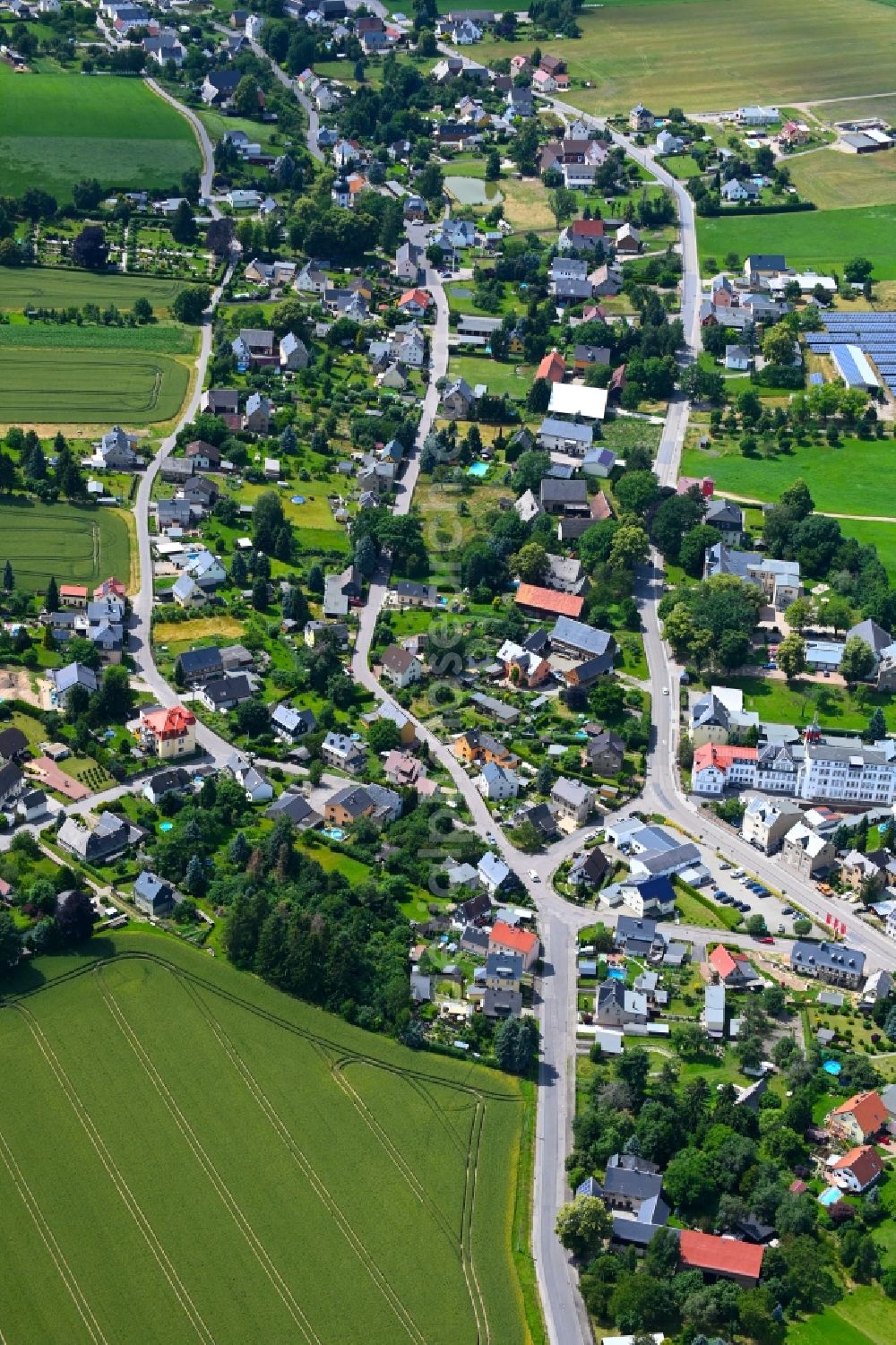 Aerial image Rußdorf - Agricultural land and field boundaries surround the settlement area of the village in Russdorf in the state Saxony, Germany