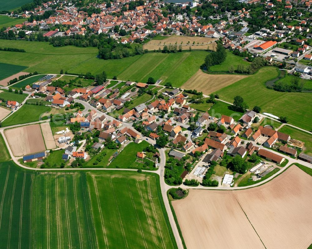 Aerial image Sachsen - Agricultural land and field boundaries surround the settlement area of the village in Sachsen in the state Bavaria, Germany