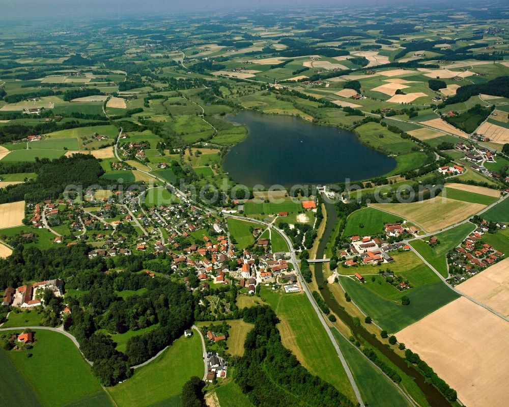 Schalldorf from the bird's eye view: Agricultural land and field boundaries surround the settlement area of the village in Schalldorf in the state Bavaria, Germany