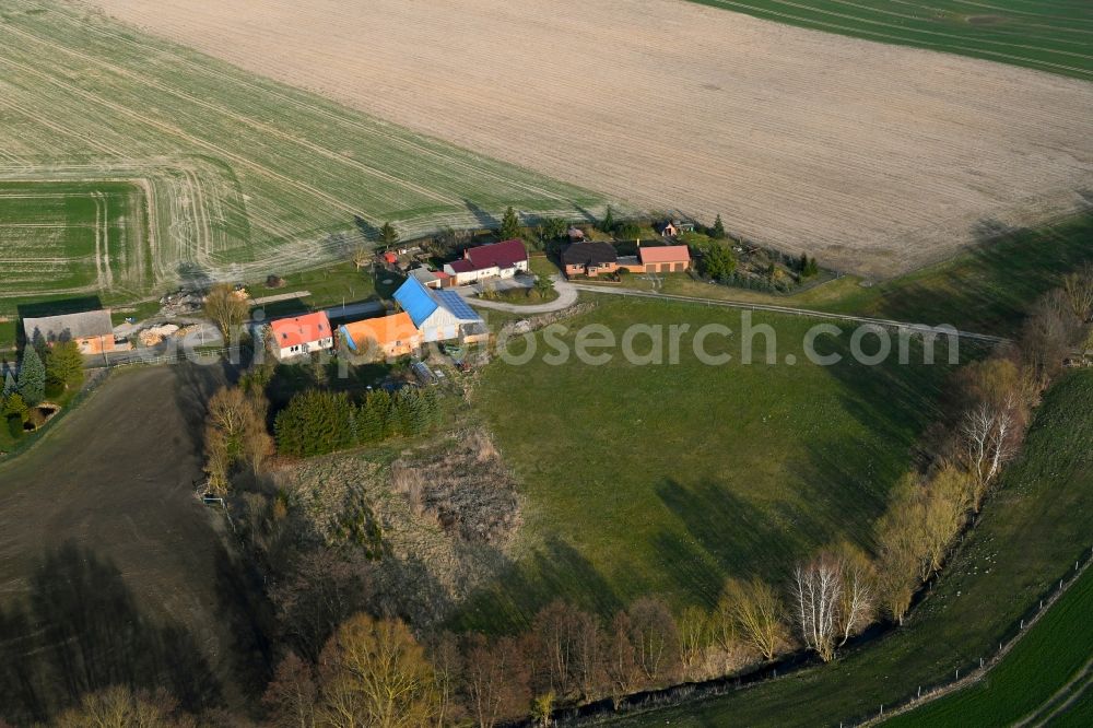 Aerial image Schapow - Agricultural land and field boundaries surround the settlement area of the village in Schapow Uckermark in the state Brandenburg, Germany