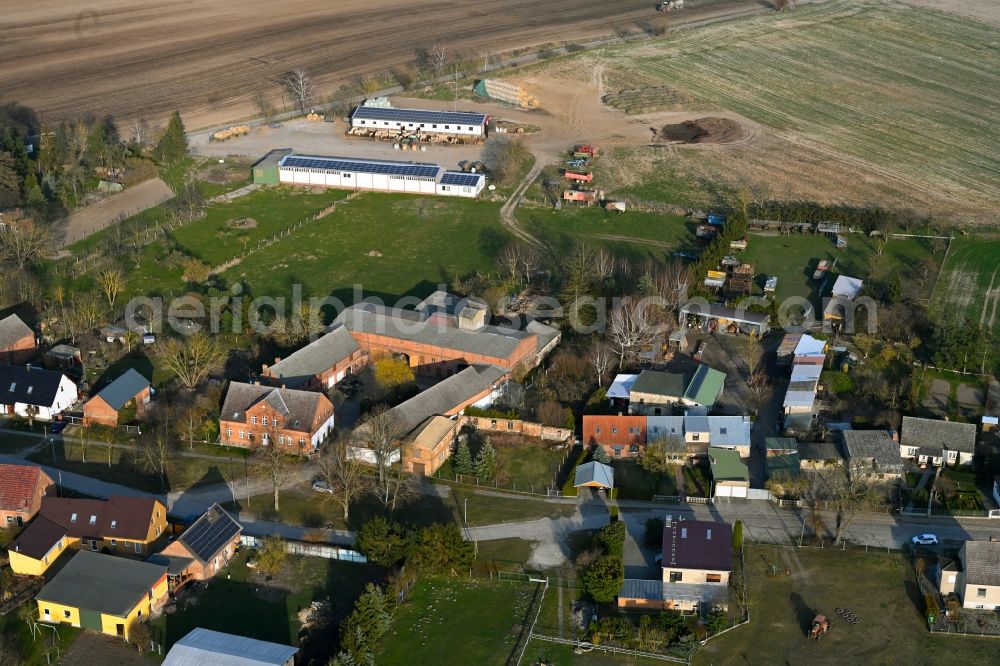 Aerial image Schapow - Agricultural land and field boundaries surround the settlement area of the village in Schapow Uckermark in the state Brandenburg, Germany