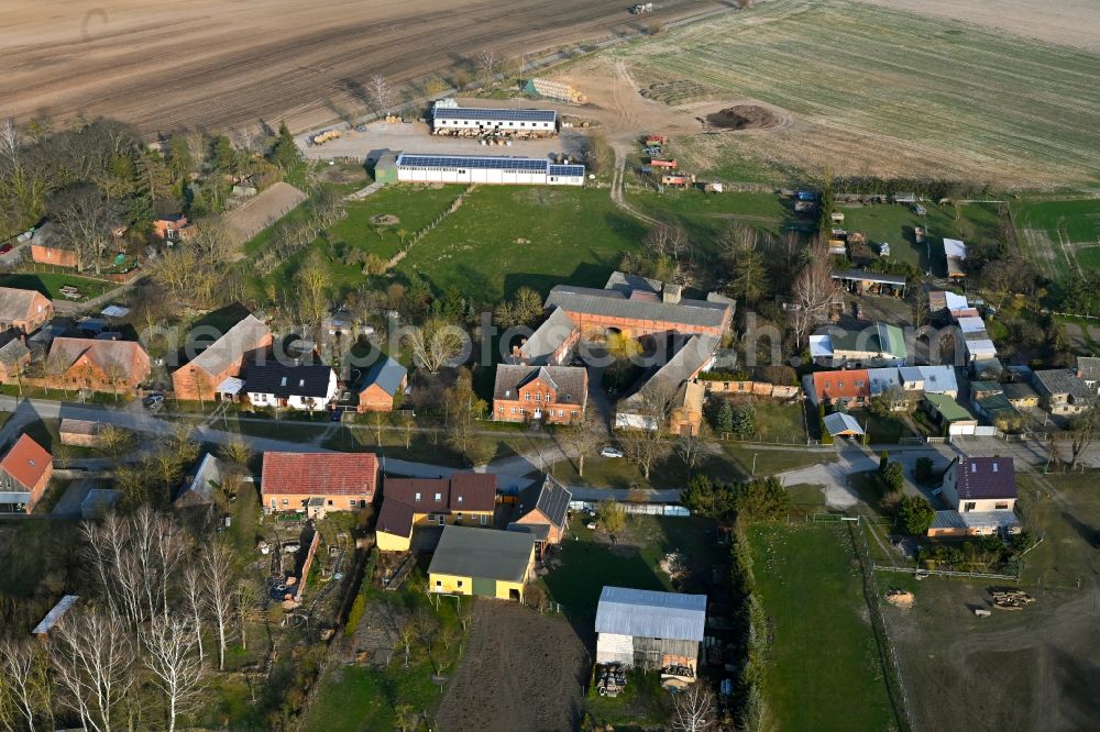 Aerial image Schapow - Agricultural land and field boundaries surround the settlement area of the village in Schapow Uckermark in the state Brandenburg, Germany