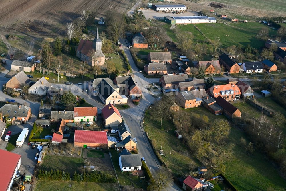 Aerial image Schapow - Agricultural land and field boundaries surround the settlement area of the village in Schapow Uckermark in the state Brandenburg, Germany