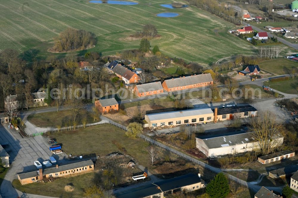 Aerial image Schapow - Agricultural land and field boundaries surround the settlement area of the village in Schapow Uckermark in the state Brandenburg, Germany