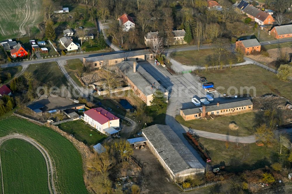 Aerial photograph Schapow - Agricultural land and field boundaries surround the settlement area of the village in Schapow Uckermark in the state Brandenburg, Germany