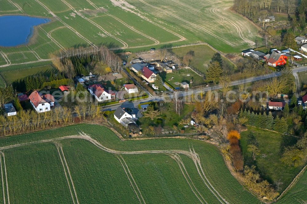 Aerial image Schapow - Agricultural land and field boundaries surround the settlement area of the village in Schapow Uckermark in the state Brandenburg, Germany