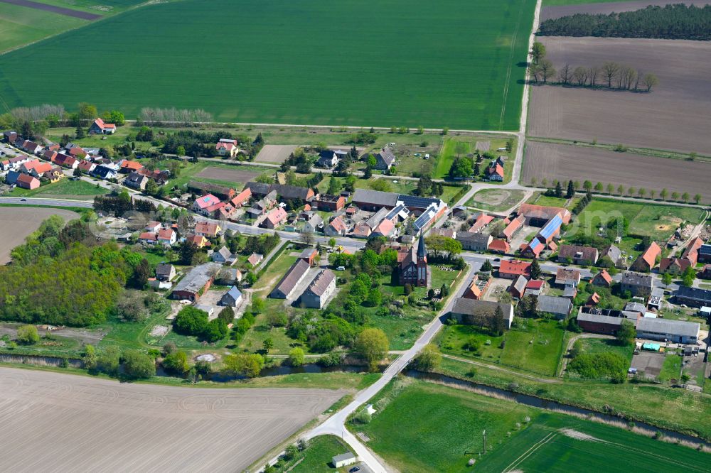 Aerial image Scharlibbe - Agricultural land and field boundaries surround the settlement area of the village in Scharlibbe in the state Saxony-Anhalt, Germany