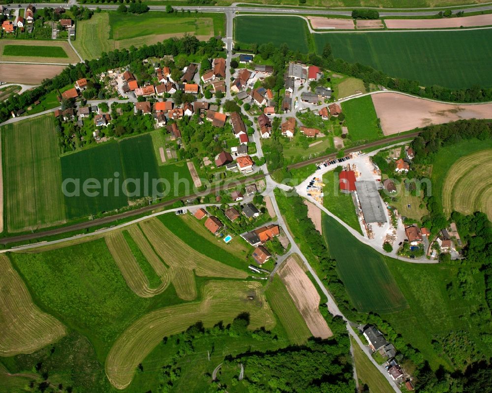 Schleißweiler from the bird's eye view: Agricultural land and field boundaries surround the settlement area of the village in Schleißweiler in the state Baden-Wuerttemberg, Germany