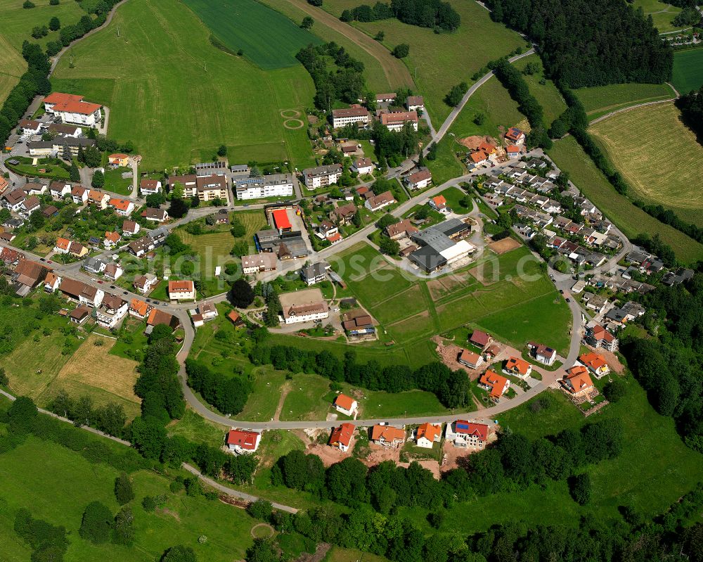 Aerial image Schömberg - Agricultural land and field boundaries surround the settlement area of the village in Schömberg in the state Baden-Wuerttemberg, Germany