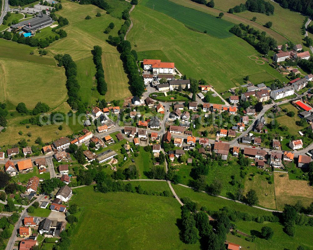 Aerial photograph Schömberg - Agricultural land and field boundaries surround the settlement area of the village in Schömberg in the state Baden-Wuerttemberg, Germany