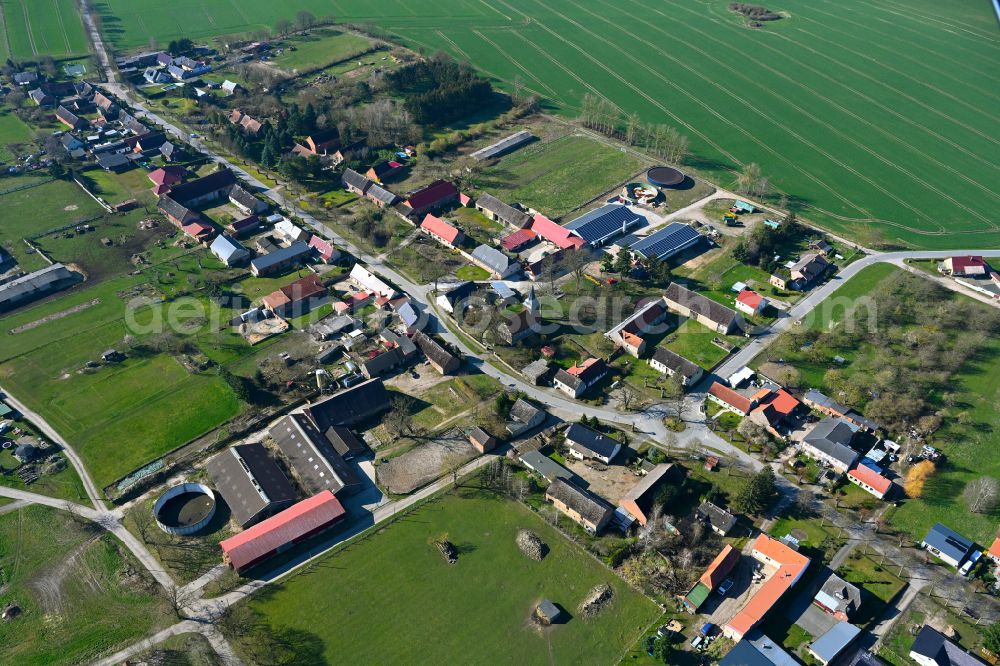 Aerial photograph Schmolde - Agricultural land and field boundaries surround the settlement area of the village in Schmolde in the state Brandenburg, Germany