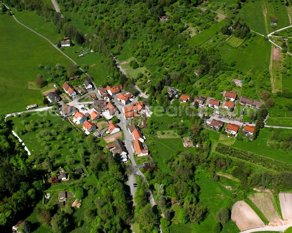 Schnait from above - Agricultural land and field boundaries surround the settlement area of the village in Schnait in the state Baden-Wuerttemberg, Germany