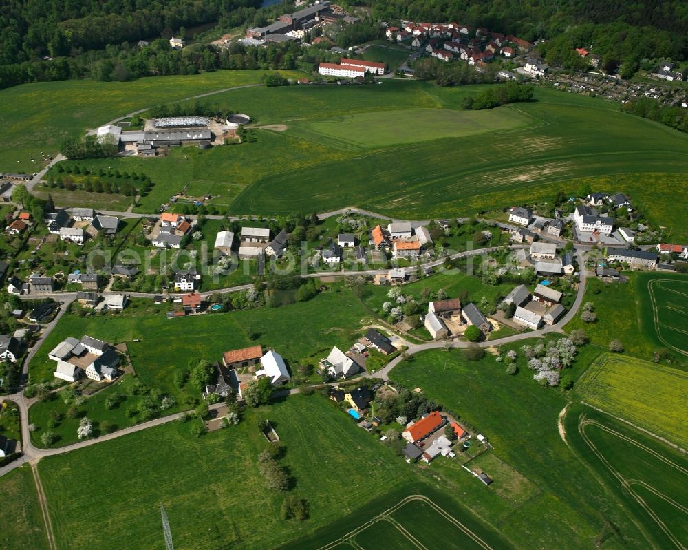 Schönborn-Dreiwerden from above - Agricultural land and field boundaries surround the settlement area of the village in Schönborn-Dreiwerden in the state Saxony, Germany