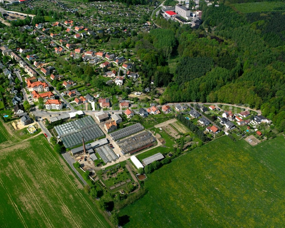 Schönborn-Dreiwerden from the bird's eye view: Agricultural land and field boundaries surround the settlement area of the village in Schönborn-Dreiwerden in the state Saxony, Germany