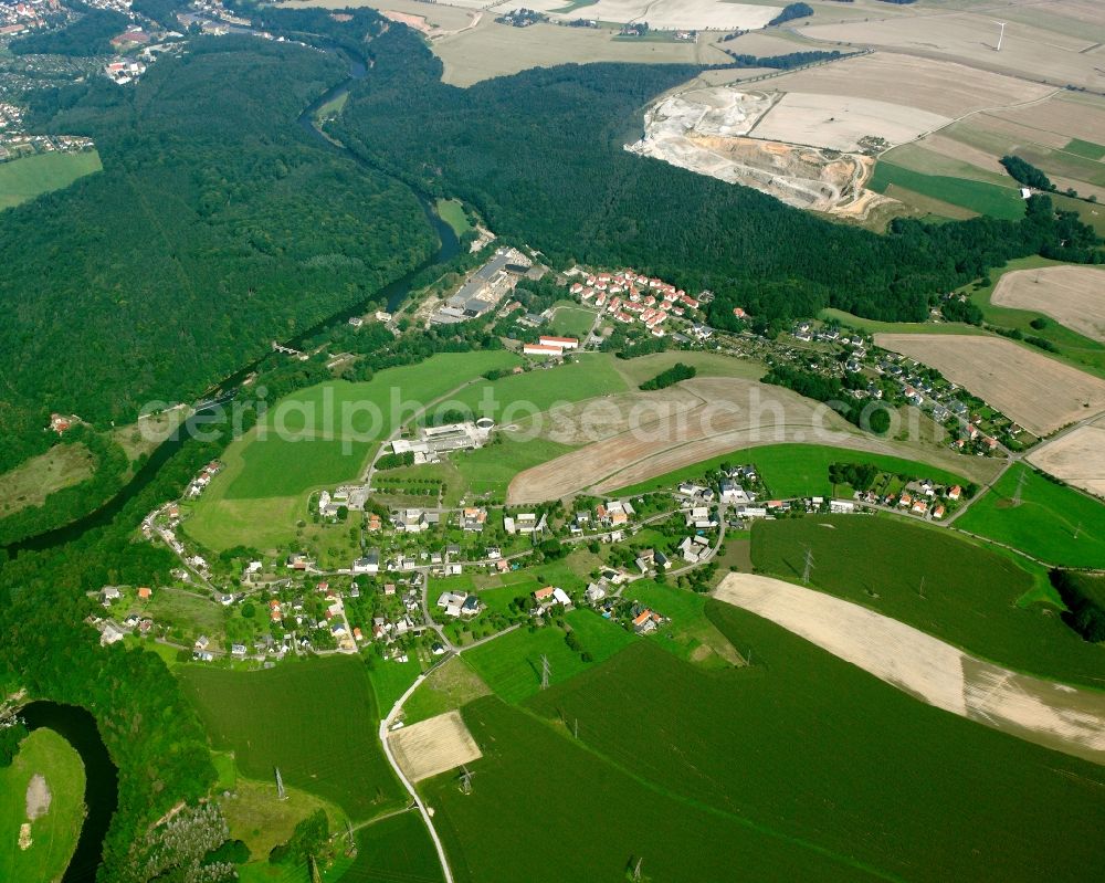 Aerial image Schönborn-Dreiwerden - Agricultural land and field boundaries surround the settlement area of the village in Schönborn-Dreiwerden in the state Saxony, Germany