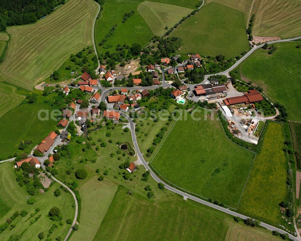 Schönbronn from the bird's eye view: Agricultural land and field boundaries surround the settlement area of the village in Schönbronn in the state Baden-Wuerttemberg, Germany