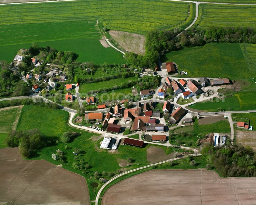 Aerial photograph Schönbronn - Agricultural land and field boundaries surround the settlement area of the village in Schönbronn in the state Bavaria, Germany