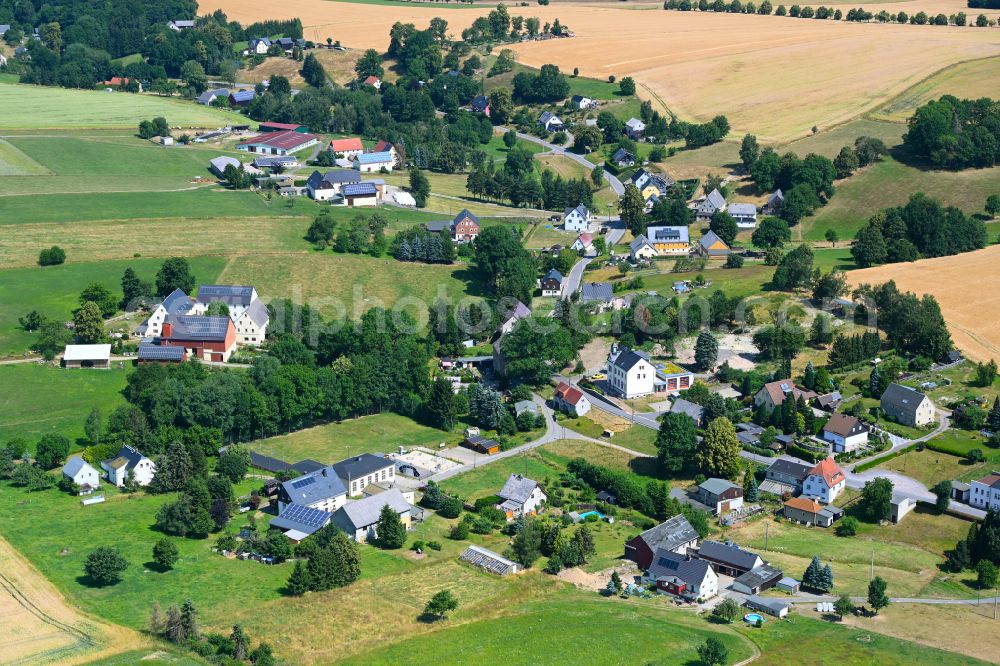 Aerial image Schönerstadt - Agricultural land and field boundaries surround the settlement area of the village in Schönerstadt in the state Saxony, Germany