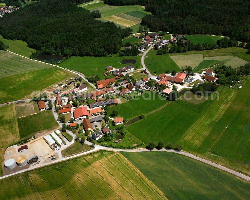 Aerial image Schwaighausen - Agricultural land and field boundaries surround the settlement area of the village in Schwaighausen in the state Bavaria, Germany