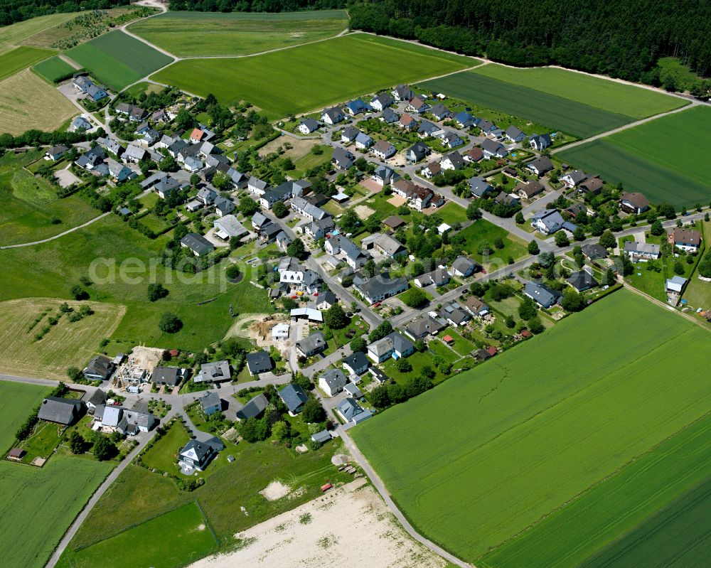 Schwall from the bird's eye view: Agricultural land and field boundaries surround the settlement area of the village in Schwall in the state Rhineland-Palatinate, Germany