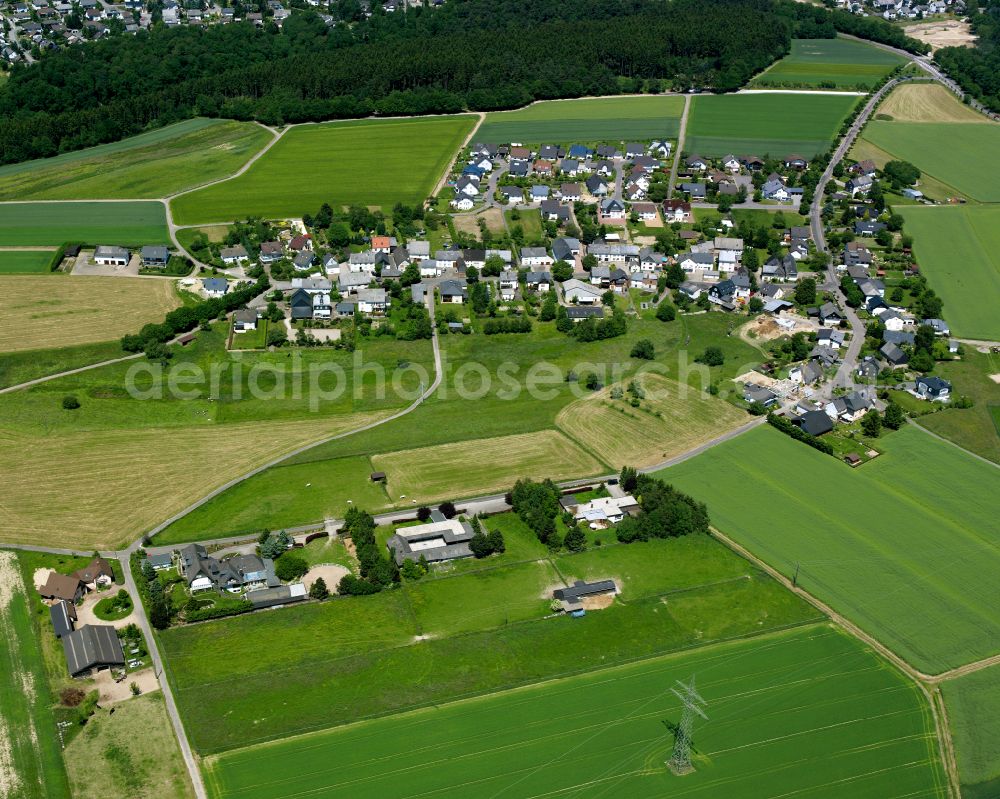 Aerial image Schwall - Agricultural land and field boundaries surround the settlement area of the village in Schwall in the state Rhineland-Palatinate, Germany