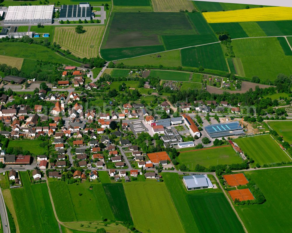 Aerial photograph Schwendi - Agricultural land and field boundaries surround the settlement area of the village in Schwendi in the state Baden-Wuerttemberg, Germany