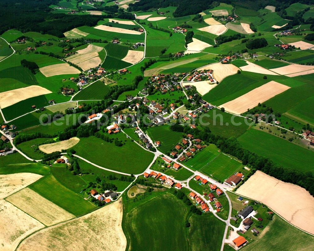 Aerial image Seebauer - Agricultural land and field boundaries surround the settlement area of the village in Seebauer in the state Bavaria, Germany