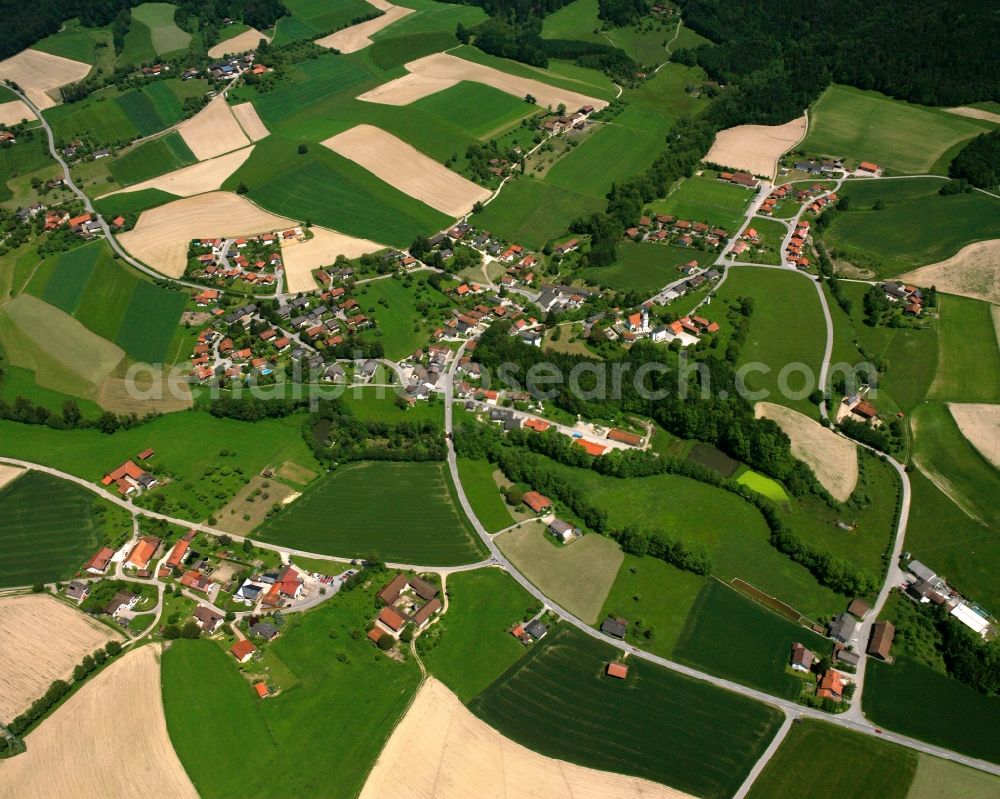 Aerial photograph Seebauer - Agricultural land and field boundaries surround the settlement area of the village in Seebauer in the state Bavaria, Germany