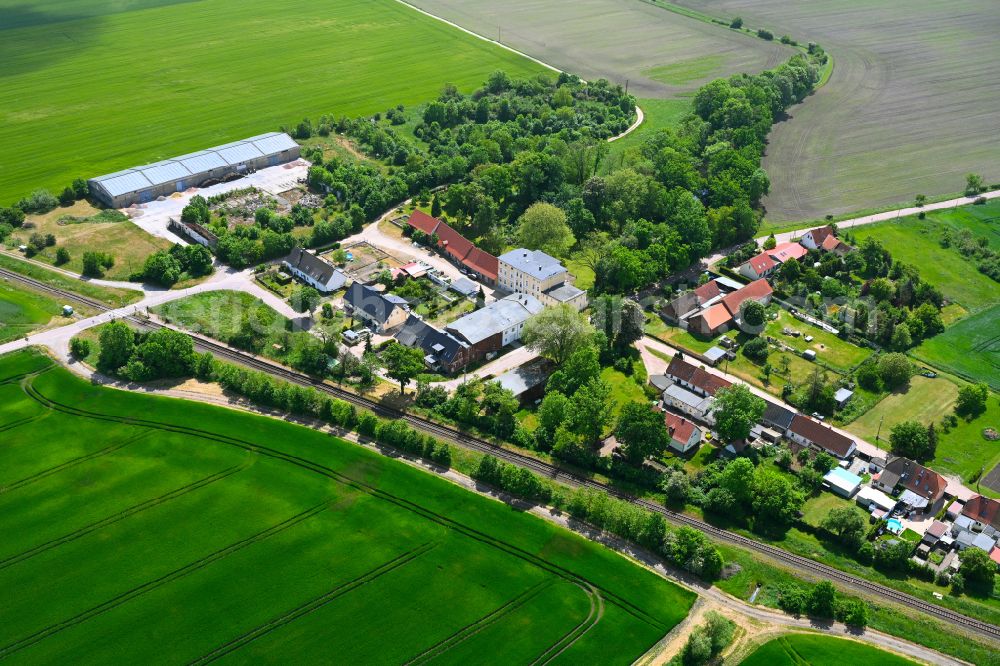 Aerial image Sibbesdorf - Agricultural land and field boundaries surround the settlement area of the village in Sibbesdorf in the state Saxony-Anhalt, Germany