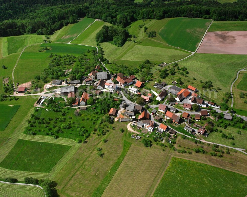 Aerial photograph Siebenknie - Agricultural land and field boundaries surround the settlement area of the village in Siebenknie in the state Baden-Wuerttemberg, Germany