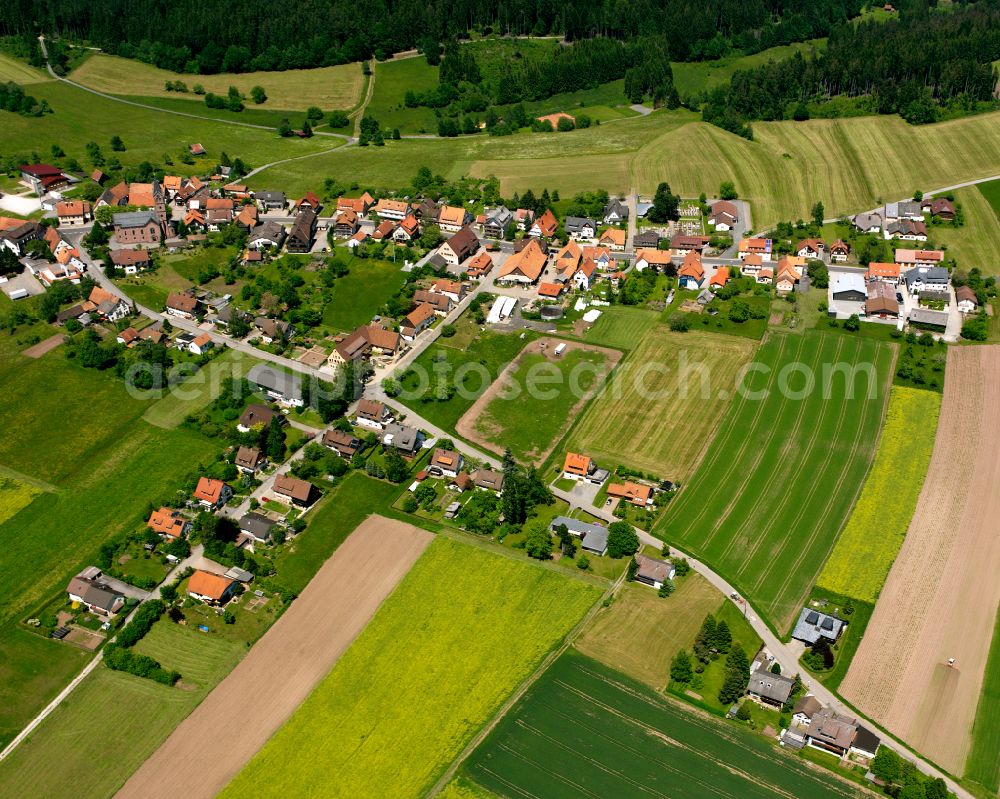 Aerial photograph Simmersfeld - Agricultural land and field boundaries surround the settlement area of the village in Simmersfeld in the state Baden-Wuerttemberg, Germany