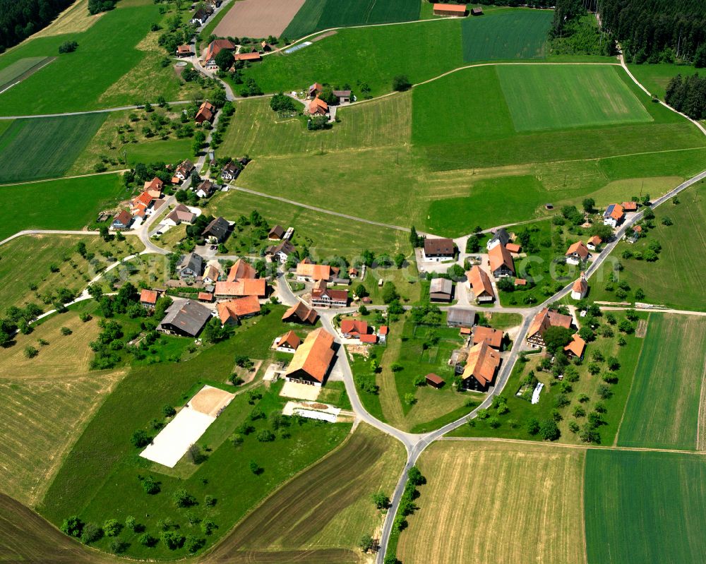 Aerial image Simmersfeld - Agricultural land and field boundaries surround the settlement area of the village in Simmersfeld in the state Baden-Wuerttemberg, Germany