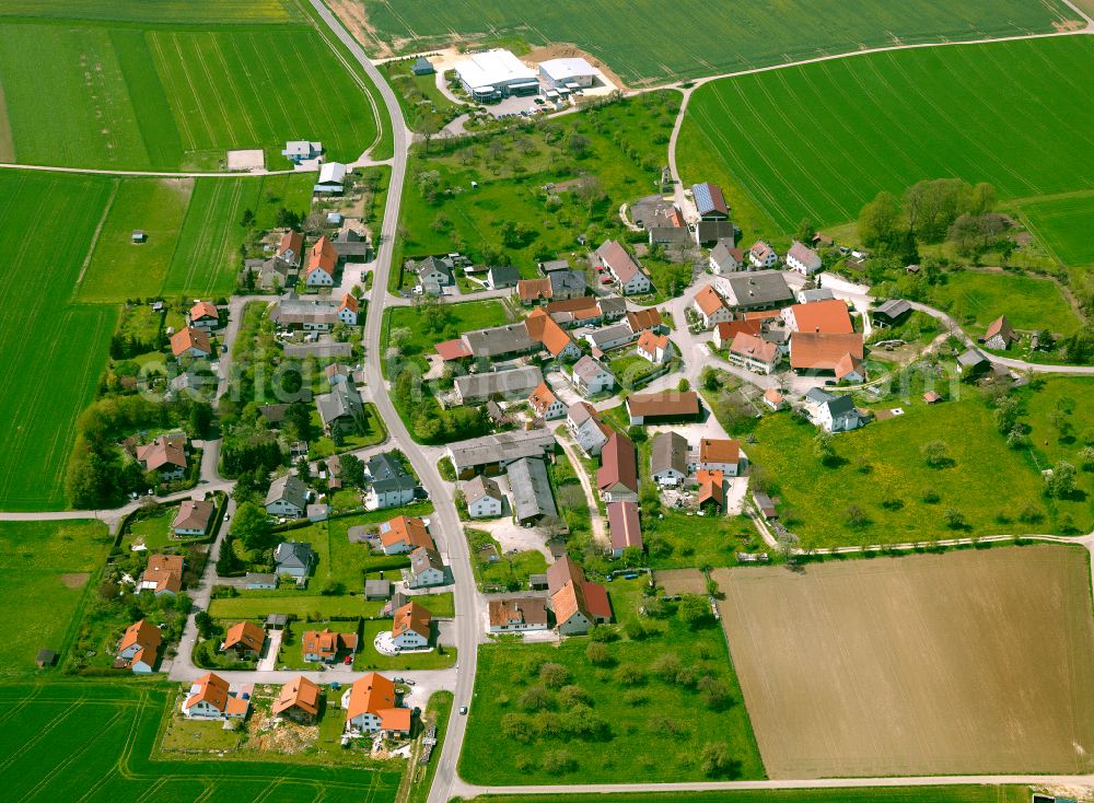 Sinabronn from above - Agricultural land and field boundaries surround the settlement area of the village in Sinabronn in the state Baden-Wuerttemberg, Germany