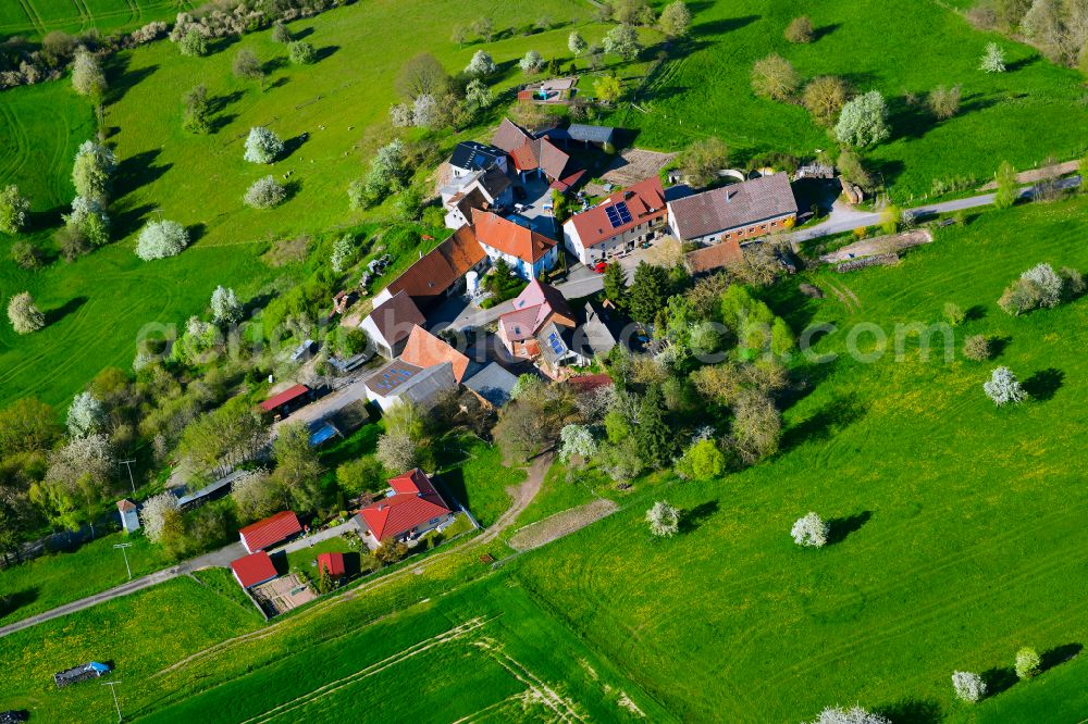 Aerial image Sixtenberg - Agricultural land and field boundaries surround the settlement area of the village in Sixtenberg in the state Bavaria, Germany