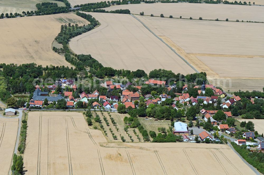 Aerial image Sohnstedt - Agricultural land and field boundaries surround the settlement area of the village in Sohnstedt in the state Thuringia, Germany