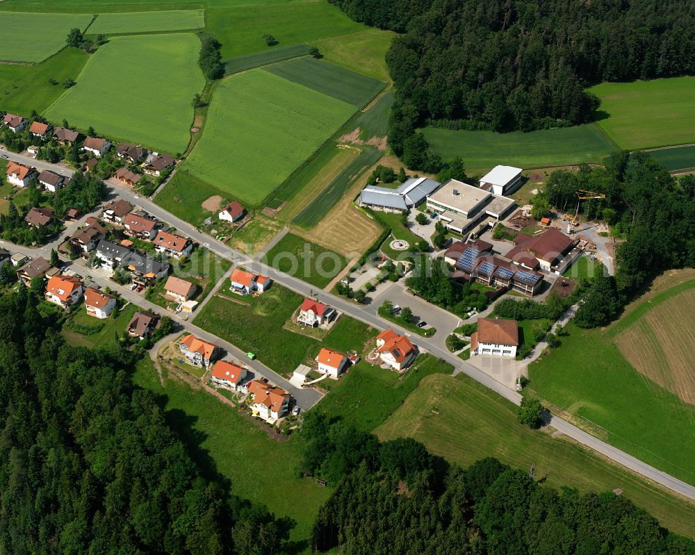 Aerial image Sommenhardt - Agricultural land and field boundaries surround the settlement area of the village in Sommenhardt in the state Baden-Wuerttemberg, Germany