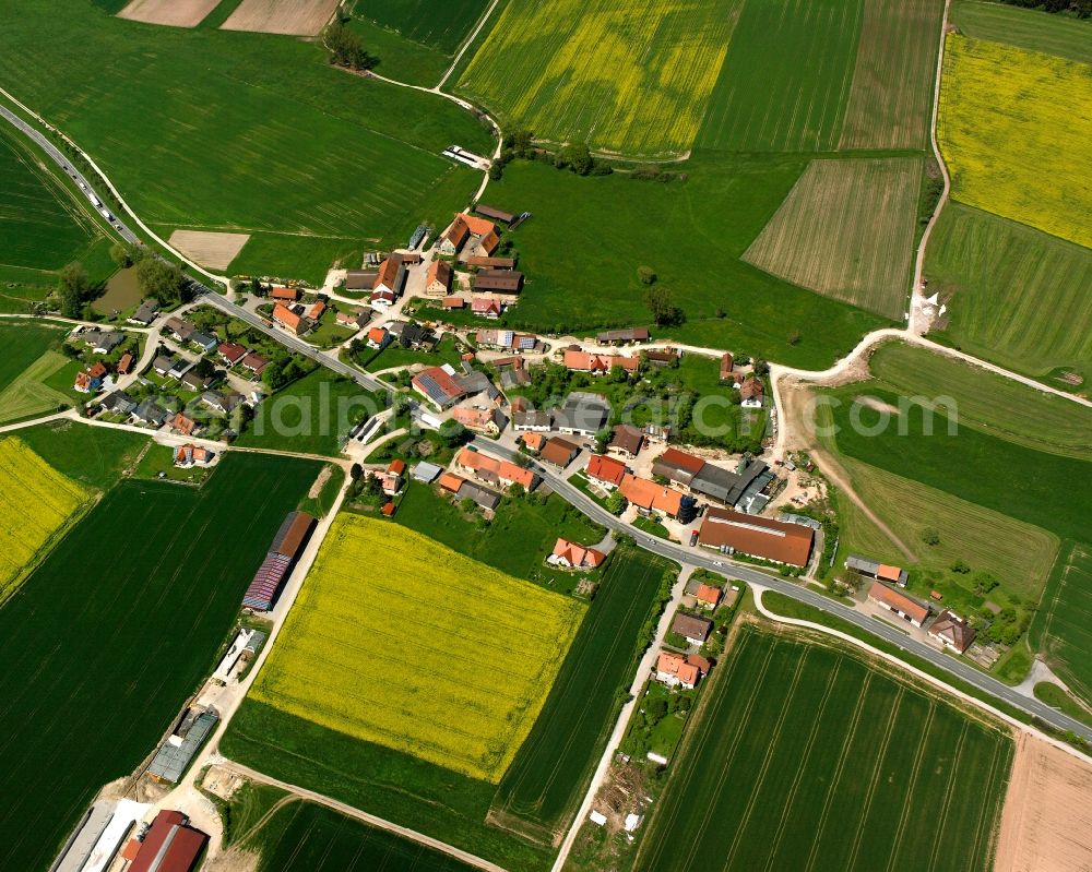 Sommerau from above - Agricultural land and field boundaries surround the settlement area of the village in Sommerau in the state Bavaria, Germany