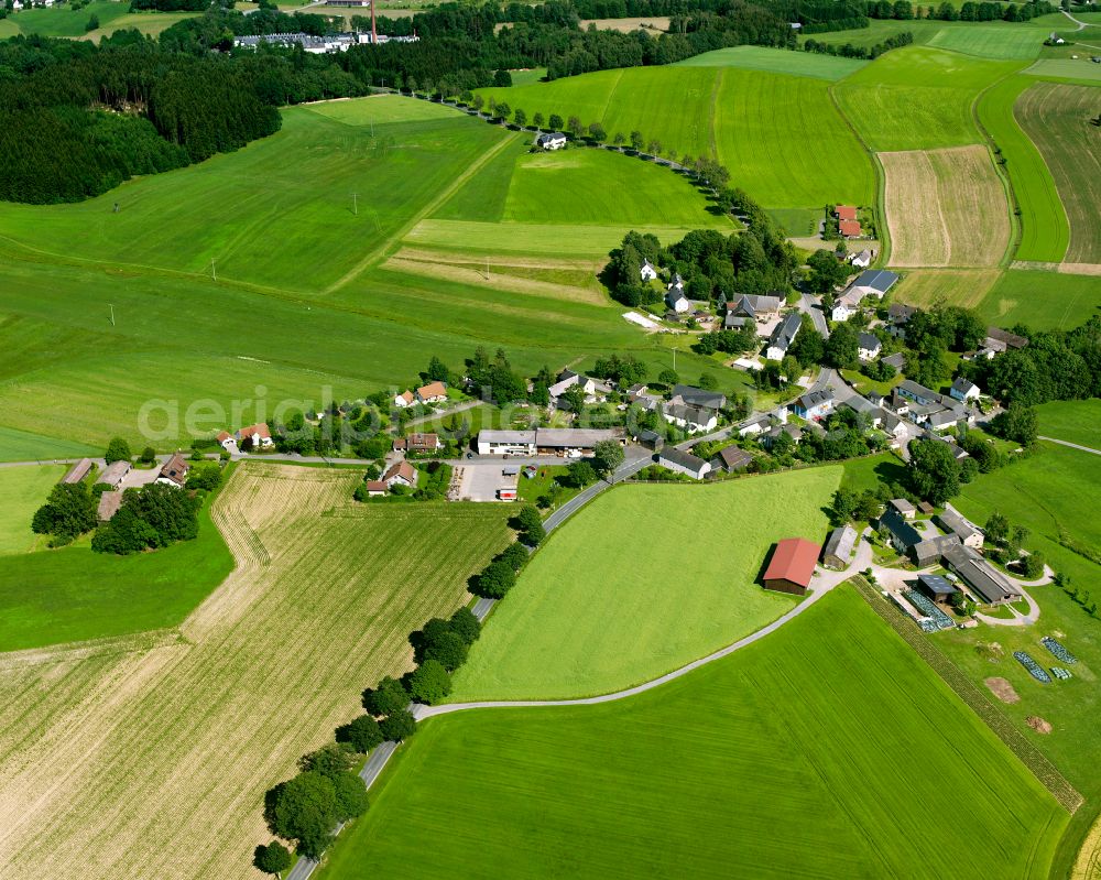 Aerial photograph Sparneck - Agricultural land and field boundaries surround the settlement area of the village on street Stockenroth in the district Germersreuth in Sparneck in the state Bavaria, Germany