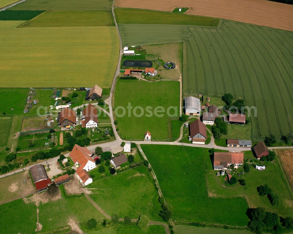 Spöck from above - Agricultural land and field boundaries surround the settlement area of the village in Spöck in the state Baden-Wuerttemberg, Germany